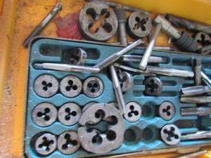 lot 71 image: Craftsman tool box  1 top storage 3 pull out drawers top is full of assorted TAPS & DIES