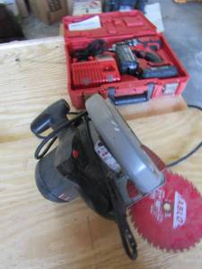 lot 77 image: 2.3 Skill Saw max motor comes with 2 blades- Milwaukee red lithium drill with charger and battery in case