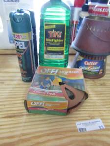 lot 83 image: TIKI fluid, cutter mosquito candles and OFF burning coils