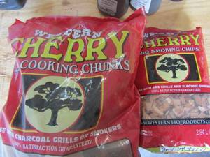 lot 89 image: 2 NEW bags of cherry wood chunks for grill or smoker