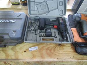 lot 107 image: Porter cable empty saw box, B&D 7.2volt in case, Ridgid air staple gun in bag