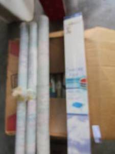 lot 115 image: Box of wall paper and cabinets fabric 10 plus rolls