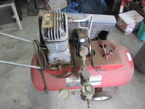 lot 158 image: Sears 4 HP red air compressor on wheels