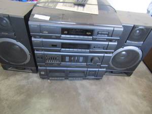 lot 279 image: Sharp Compact Disc music system CMS960CD original paperwork, remote, 5 disc changer, and 2 speakers