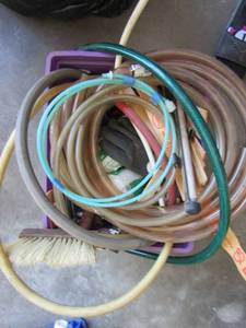 lot 281 image: Purple crate full of various hoses