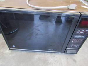 lot 283 image: Working GE multi setting microwave
