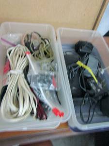 lot 320 image: 2 small storage tubs of misc. plugs