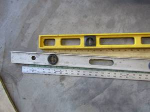 lot 324 image: Yard sticks and levels