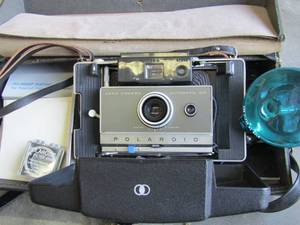 lot 327 image: Polaroid land camera with case and flash original paperwork