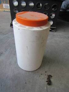 lot 336 image: 20 plus white bottles with orange lids