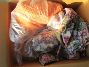 lot 337 image: Orange throw and floral sofa cover