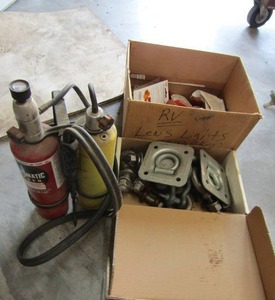 lot 350 image: Box of bike lights, automatic torch and tie rings