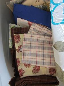 lot 383 image: Tub of fabric assorted patterns and colors