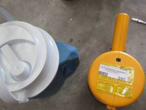 lot 395 image: 12 gallon water jug  and QB light 1,000,000 candle power