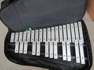 lot 420 image: Xylophone and case with standards of excellence music books
