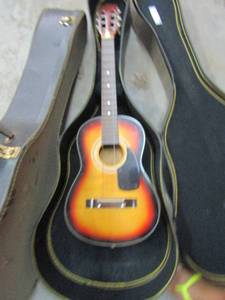 lot 424 image: Reinforced neck guitar  missing strings with case and additional empty case