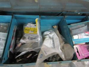 lot 495 image: Clamps, spark plugs and connectors  ( CONTENTS OF 9 BINS )