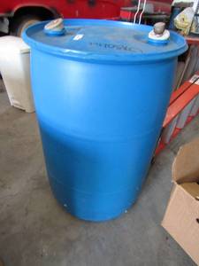 lot 548 image: 50 gallon blue gasoline drum