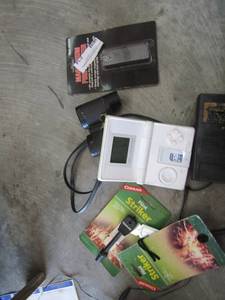 lot 634 image: Fire starterS, Binoculars and hand held radio