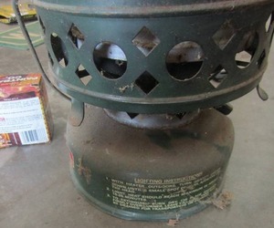 lot 635 image: Paint ball CO2 cartridges coleman 3500 BTU heater