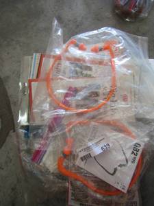 lot 639 image: Wrap around air plugs & various mops