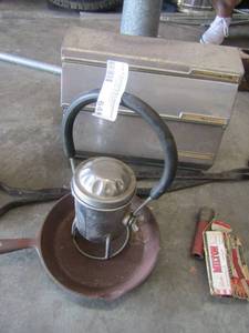 lot 648 image: Aluminum foil, waxed paper, paper towel holder     6 cast iron skillet, RAILROAD LATERN, FIREPLACE TOOL