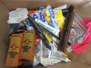 lot 674 image: Box of gun cleaning components