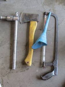 lot 687 image: Funnels, hand saws and hammers