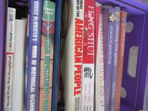 lot 700 image: Purple tote of gardening and home improvement books