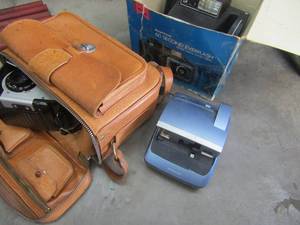 lot 705 image: Polaroid 600 camera, bulls eye brown camera with case and more