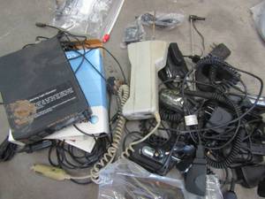 lot 707 image: Phone chargers for home and car, Motorola Verizon AT&T flip phones Vintage metro cell phone