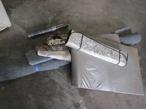 lot 769 image: Used roll outdoor carpet,   window sun blocker 2 outdoor swags