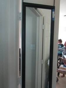 lot 1046 image: DOOR HANGING MIRROR FULL LENGTH  BLACK FRAME 50L X 14 W