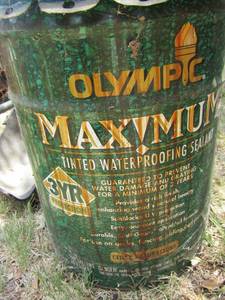 lot 1062 image: OLYMPIC WATER PROOF SEALENT TINTED - OPENED