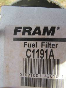 lot 933 image: Black 5 lb. bucket of Fram fuel filters