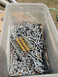 lot 934 image: 2 boxes and 1  tote of roofing nails 11x716 and 1 14
