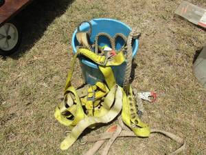 lot 944 image: Blue bucket of rope and safety harness