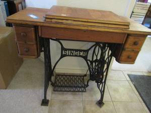 lot 188 image: VINTAGE Singer sewing machine #66 82387 original paperwork 29x34 x16 closed IN TREDLE SEWING CABINET 2 DRAWES PER SIDE