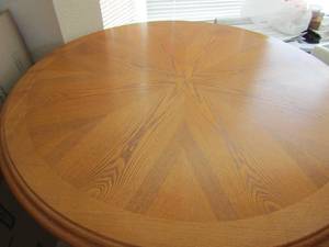 lot 190 image: Ashley Furniture Oval Dining Table with black metal frame 30x44 like new