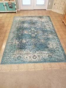 lot 26 image: Very nice Oriental Weavers 6 by 9 rug with padding
