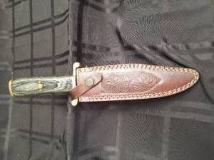 lot 74 image: Hunting knife with leather sheath - 12 long