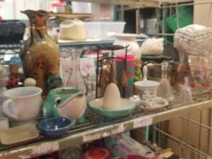 lot 97 image: Shelf lot of house decor. and collectibles