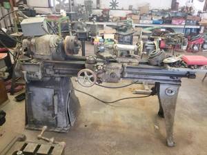 lot 233 image: Southbend 13-inch lathe with lots of extra - kept in great condition - owner used in his home shop till passing