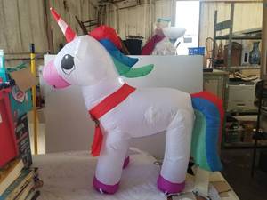 lot 175 image: Blow-up Christmas yard decoration - Unicorn - 4 foot tall