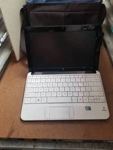 lot 142 image: HP mini 110 laptop with carry case