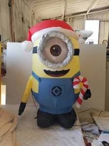 lot 135 image: Blow-up Christmas yard decoration - Minion - 3 foot tall
