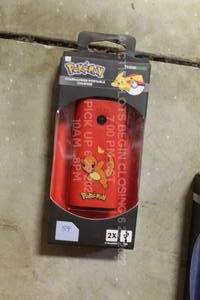 lot 59 image: Charmander Pokemon Portable Phone Battery Charger New in Box