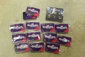 lot 67 image: Lot of 13 Marvel Avengers and Guardians of the Galaxy Tins and Superhero Pins for Marvel Video Games