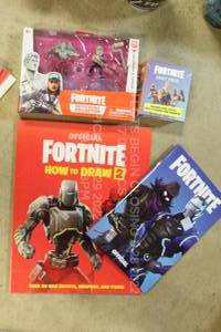 lot 82 image: Fortnite Pack with How To Draw booklet, Loot Pack with 12 Items, Battle Royale Collection Figures, and Fortnite Notebook for Video Game Log