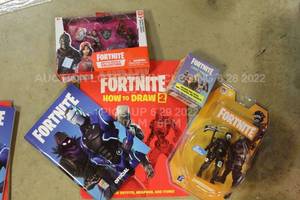 lot 84 image: Fortnite Lot Pack with How To Draw booklet, Loot Pack with 12 Items, Battle Royale Collection Figures, Supersonic Solo Mode figure, and Fortnite Notebook for Video Game Log